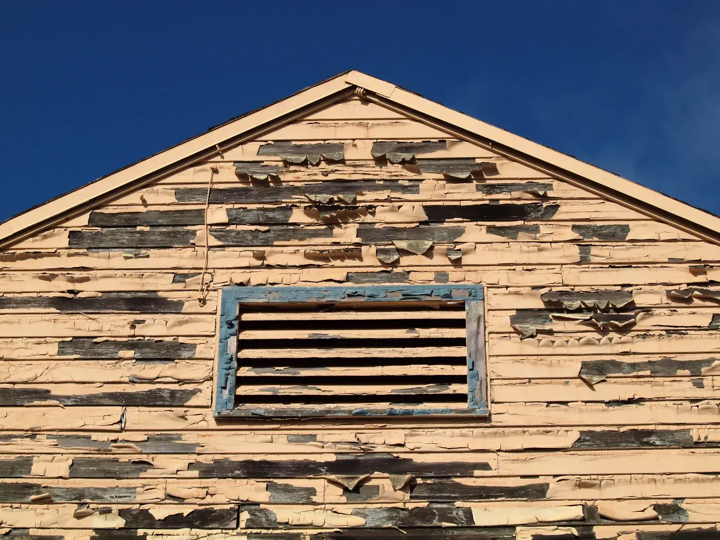 Flaking timber wall requiring a full exterior restoration